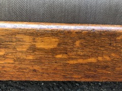 Quarter sawed oak grain in front seat rail.
